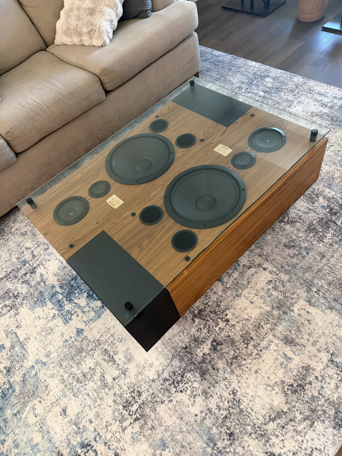 Vintage speaker coffee table with a glass top and hickory shadow boxes